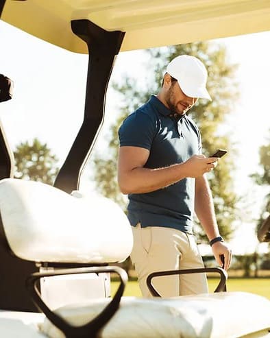 golfer using phone