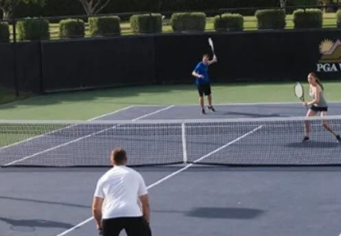 tennis players on court